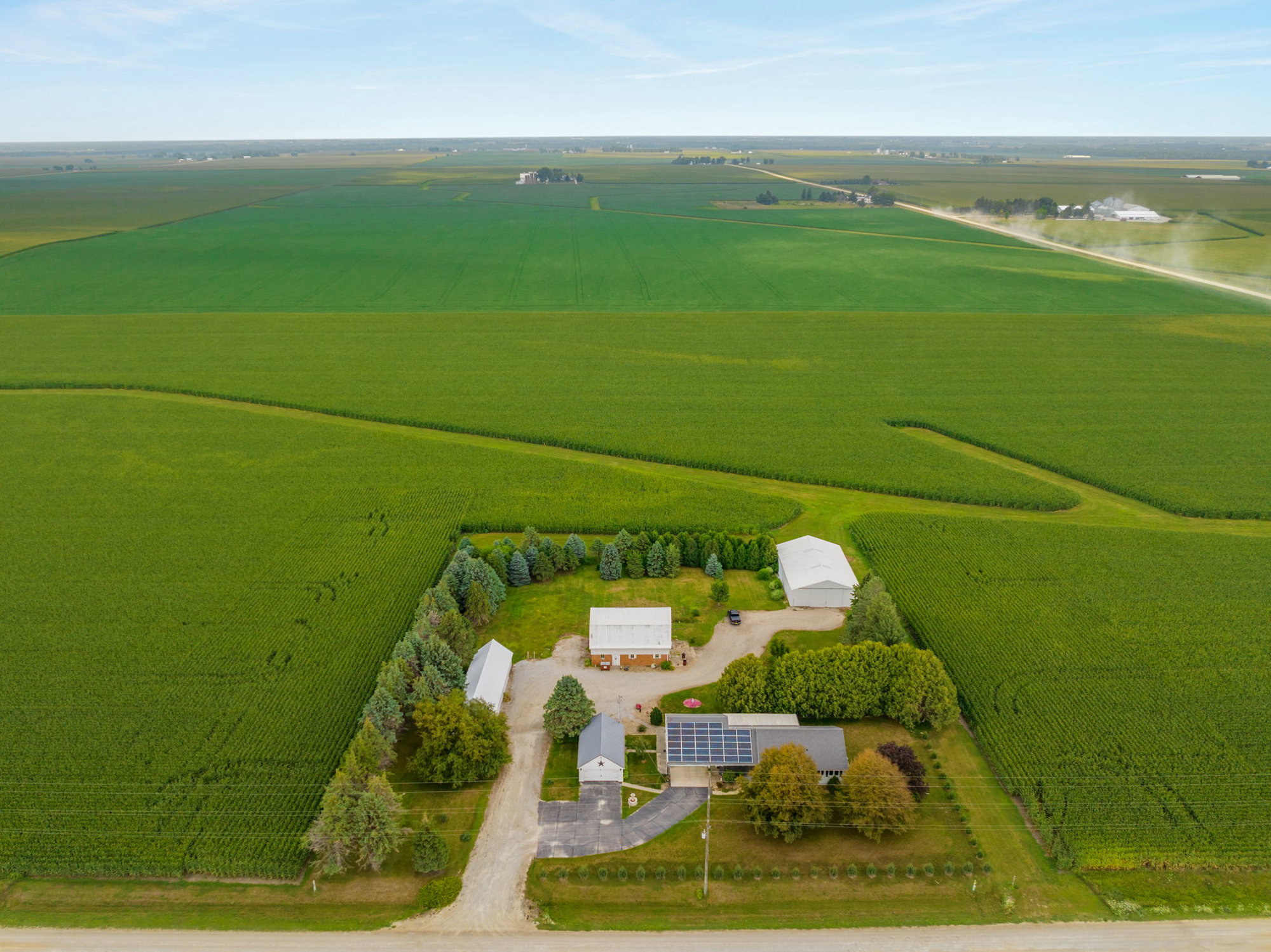 This Acreage in Jesup Iowa has everything you would want for small town living